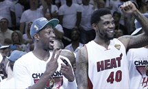 Wade y Haslem celebran uno de los 3 títulos de Heat