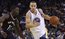 Los Warriors ganan con 34 puntos de Stephen Curry pese a los 35 de Anthony Davis